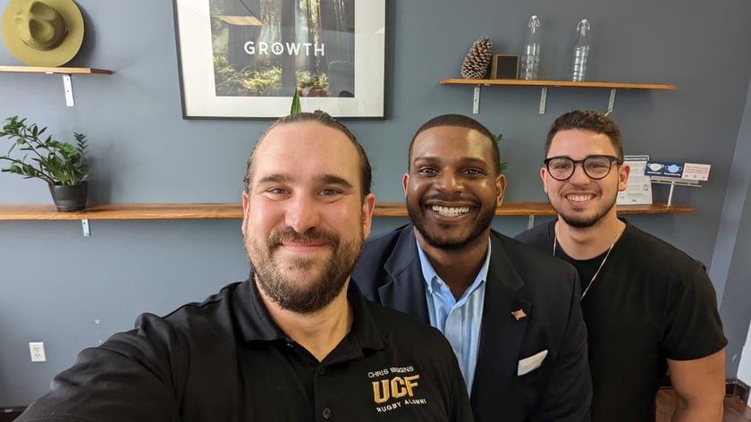 Growth Founder Chris Nault (front) with clients from First Financial and Nexxo Fleet in the Growth HQ in Orlando, Florida.