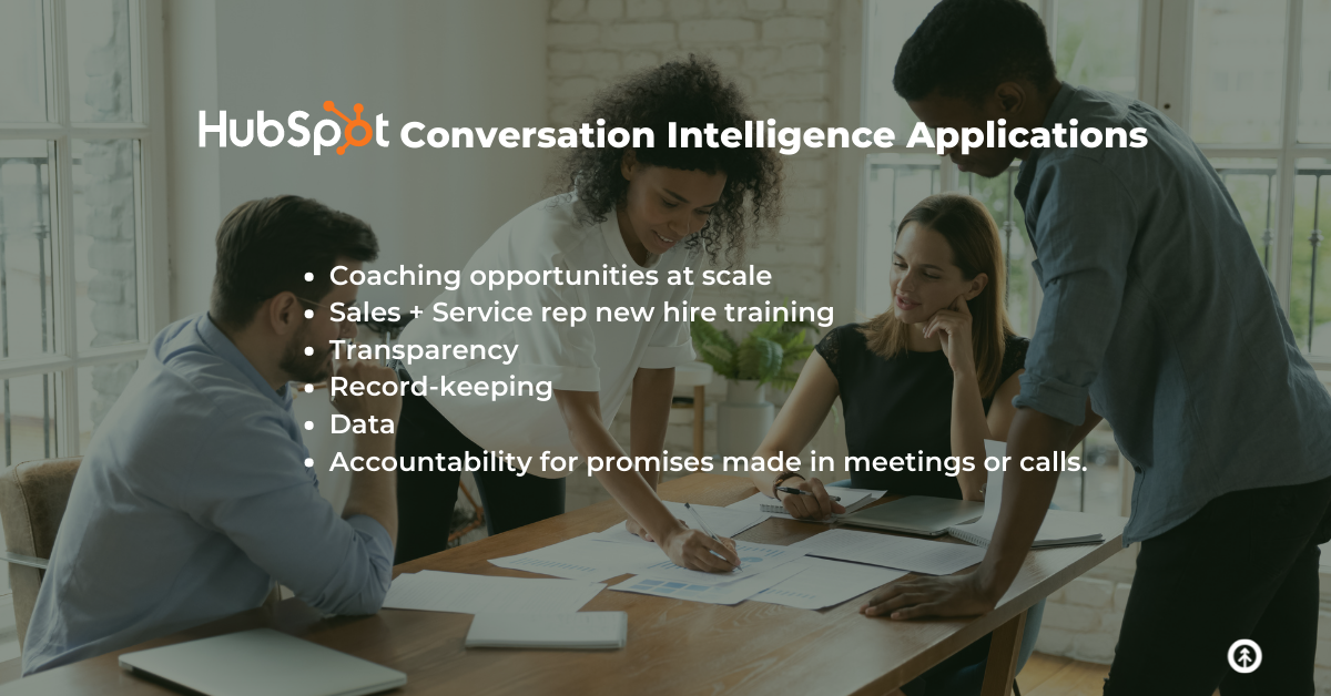 A team of analysts listen to one member talk about the data their pointing to on a sheet of paper with a list of HubSpot applications provided by Growth Marketing Firm. 