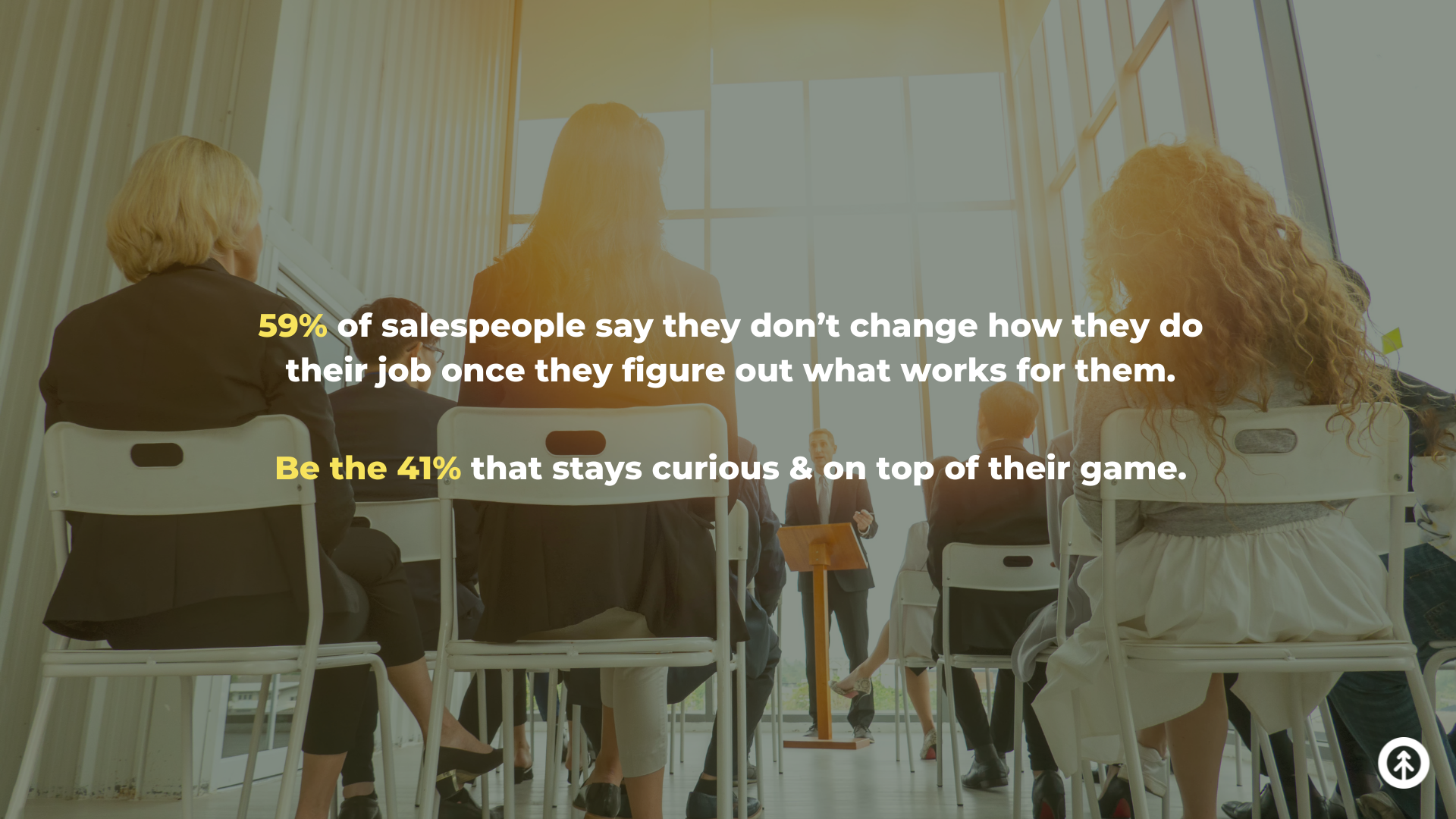 A group of salespeople in professional training with a quote about being a life-long learner from Growth Marketing Firm.