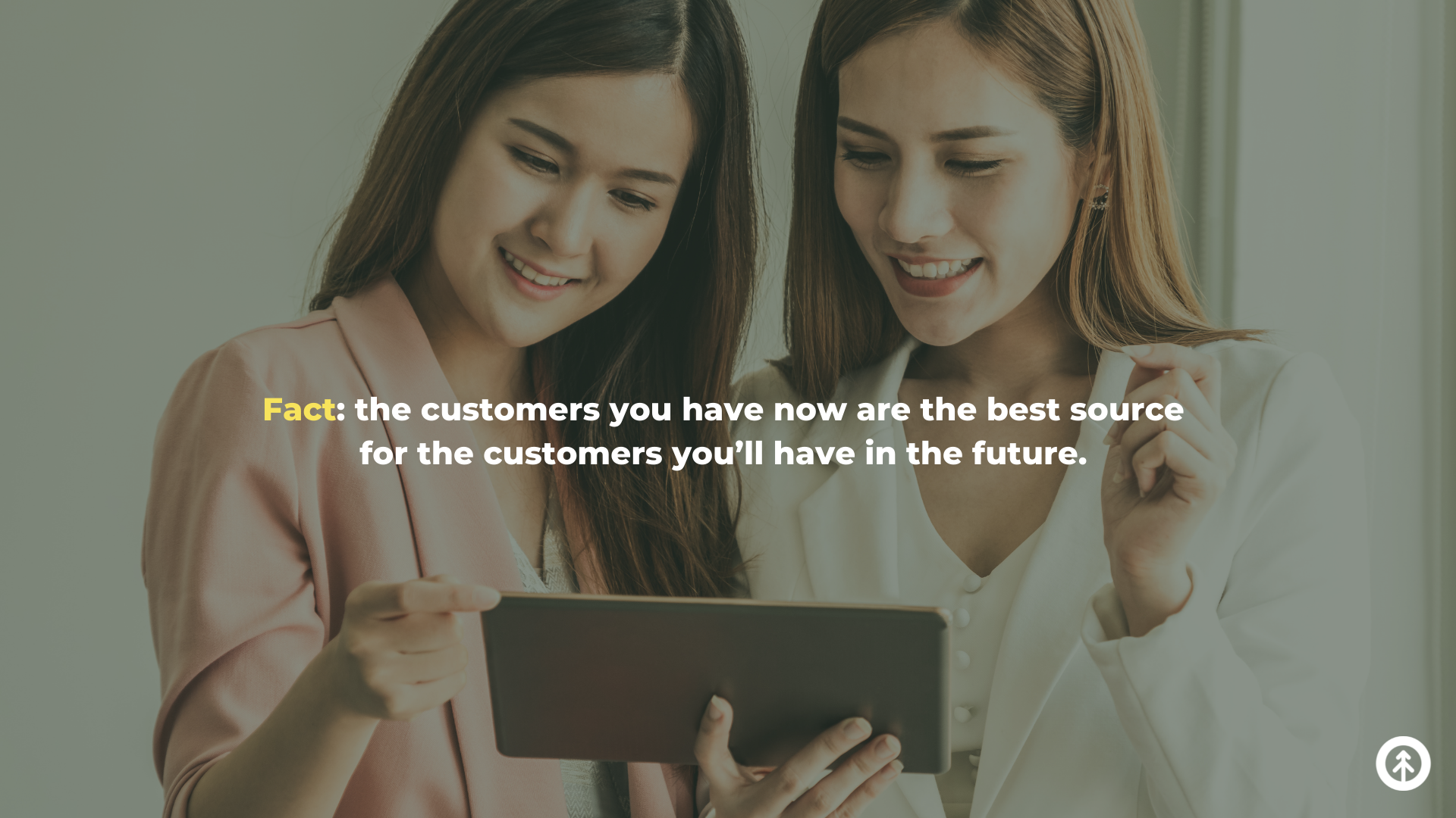 Two executives share good information about a client on a mobile device with a quote about customer referrals from Growth Marketing Firm.